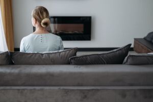 woman sitting on a sofa